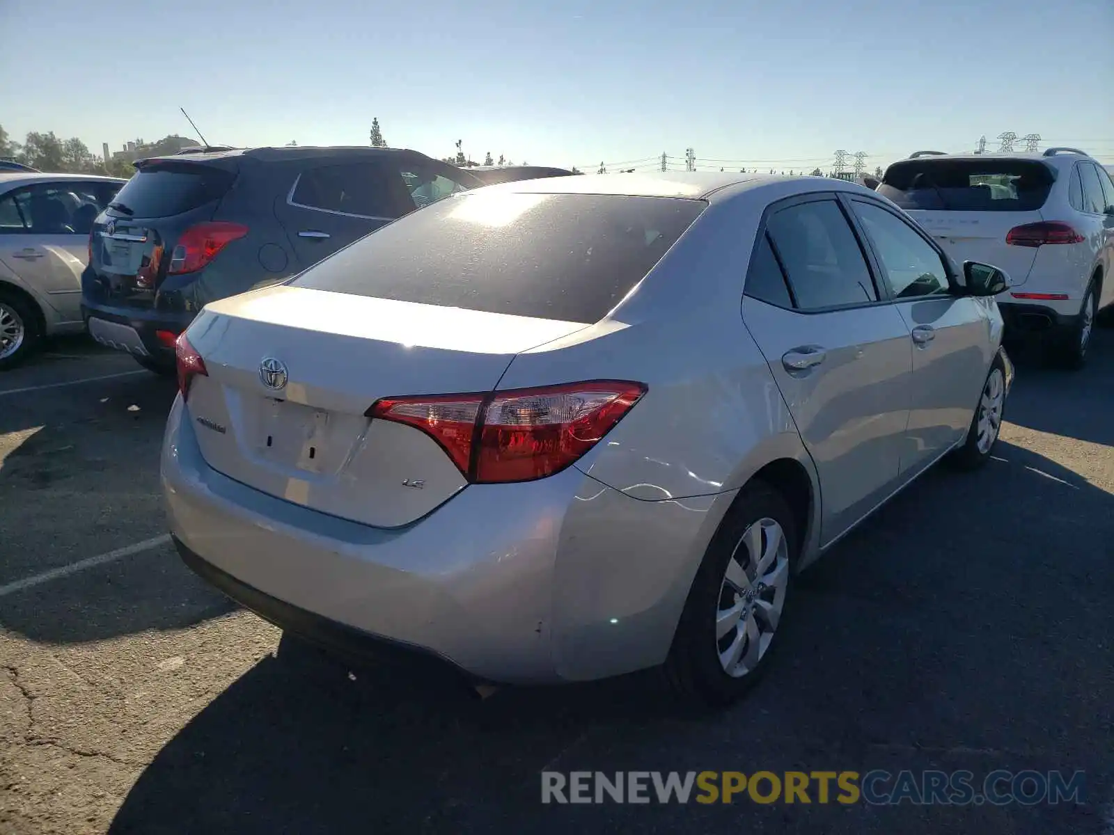 4 Photograph of a damaged car 5YFBURHE5KP894068 TOYOTA COROLLA 2019