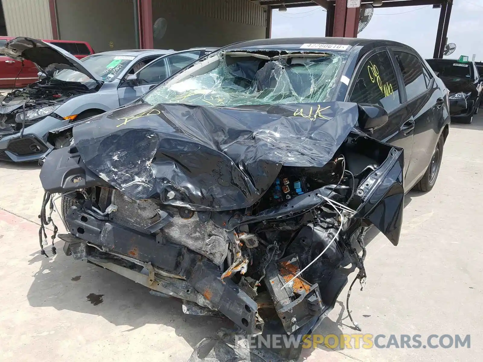 2 Photograph of a damaged car 5YFBURHE6KP863024 TOYOTA COROLLA 2019