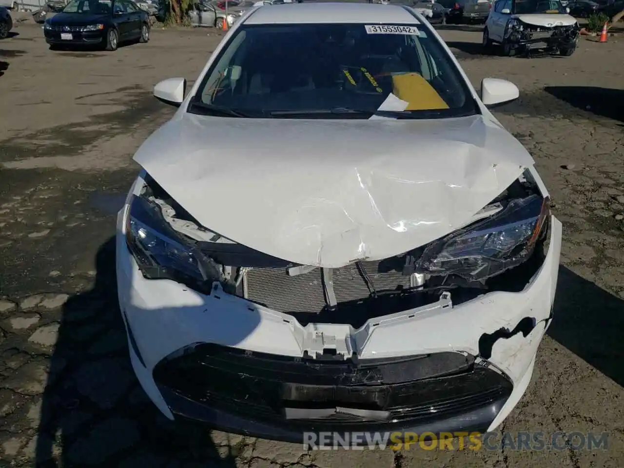 7 Photograph of a damaged car 5YFBURHE6KP867056 TOYOTA COROLLA 2019