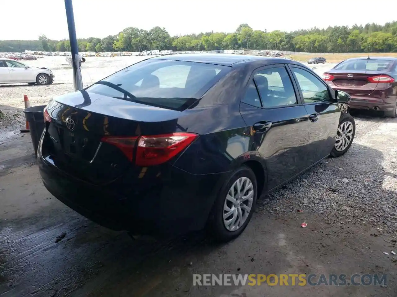 4 Photograph of a damaged car 5YFBURHE6KP897951 TOYOTA COROLLA 2019