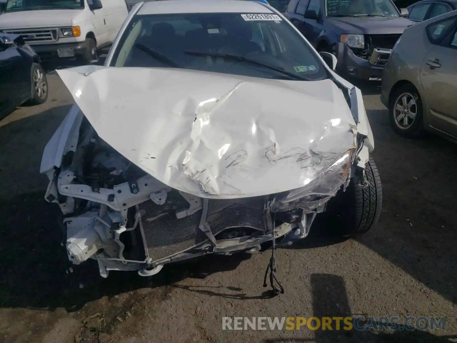 7 Photograph of a damaged car 5YFBURHE6KP912383 TOYOTA COROLLA 2019