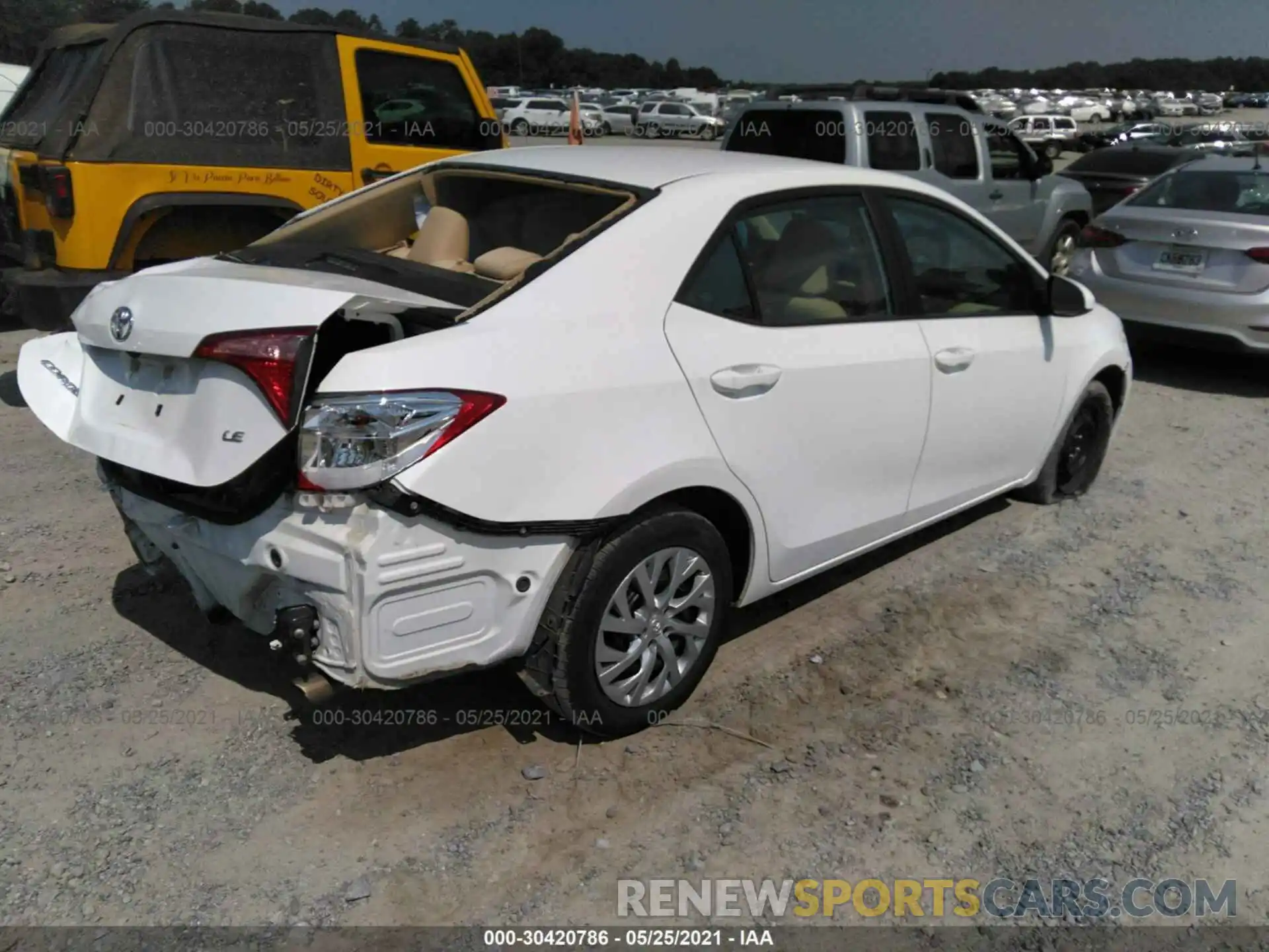 4 Photograph of a damaged car 5YFBURHE6KP935470 TOYOTA COROLLA 2019