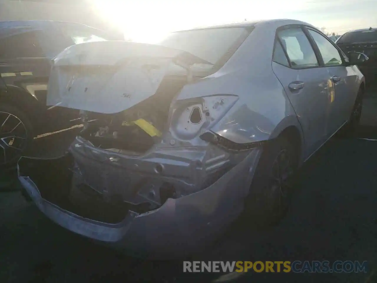 4 Photograph of a damaged car 5YFBURHE7KP857748 TOYOTA COROLLA 2019