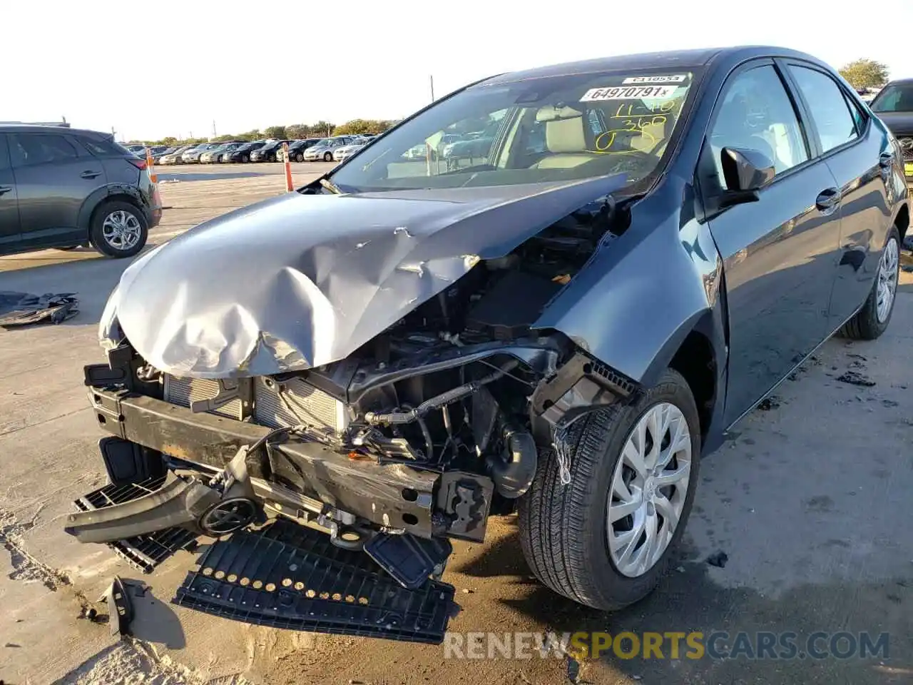 2 Photograph of a damaged car 5YFBURHE7KP864733 TOYOTA COROLLA 2019