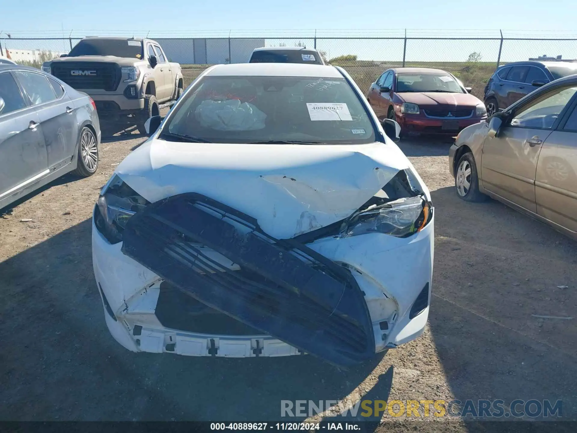 12 Photograph of a damaged car 5YFBURHE7KP875277 TOYOTA COROLLA 2019