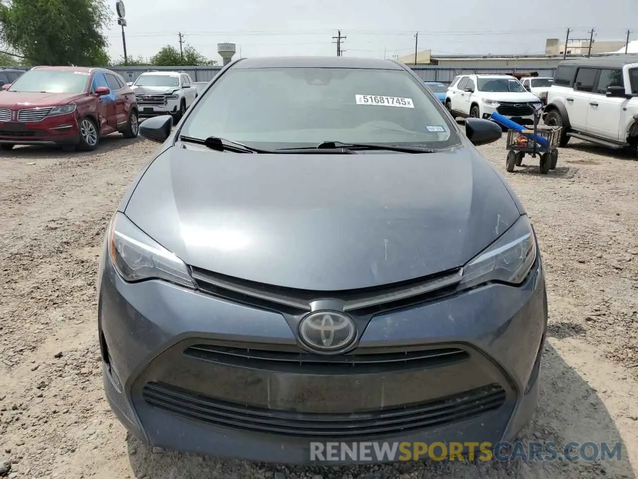 5 Photograph of a damaged car 5YFBURHE7KP903854 TOYOTA COROLLA 2019