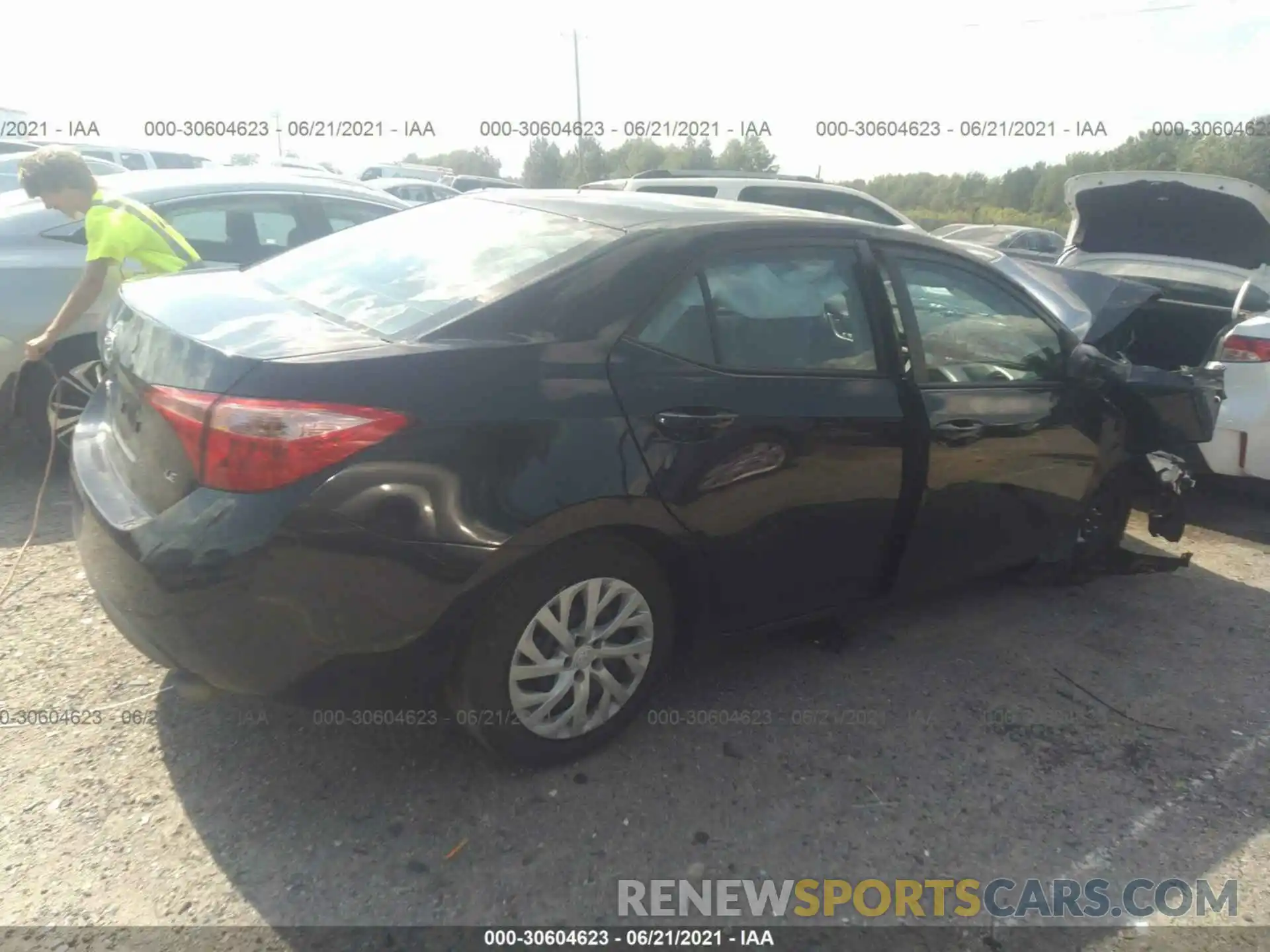 4 Photograph of a damaged car 5YFBURHE7KP944517 TOYOTA COROLLA 2019