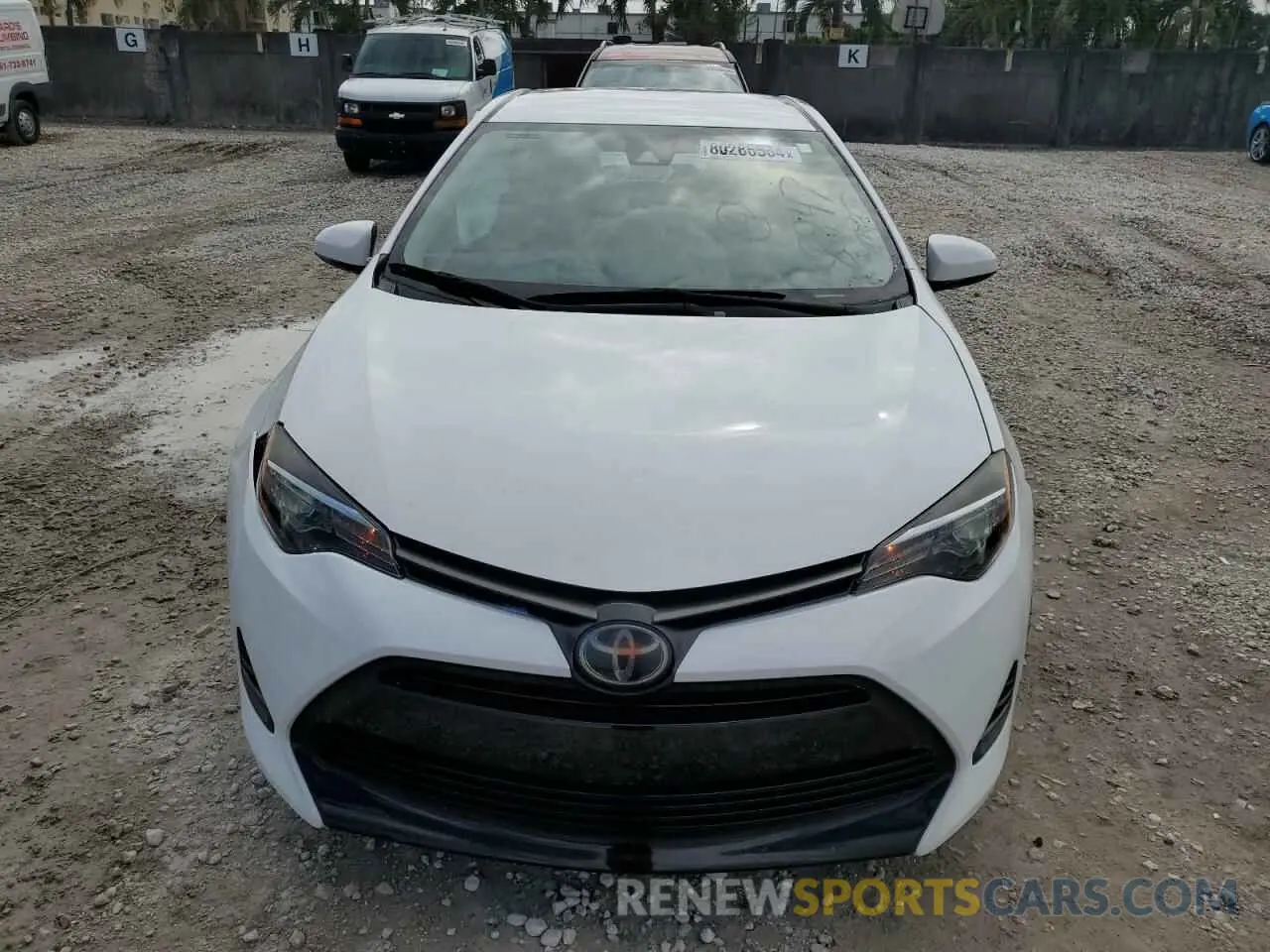 5 Photograph of a damaged car 5YFBURHE8KP878947 TOYOTA COROLLA 2019