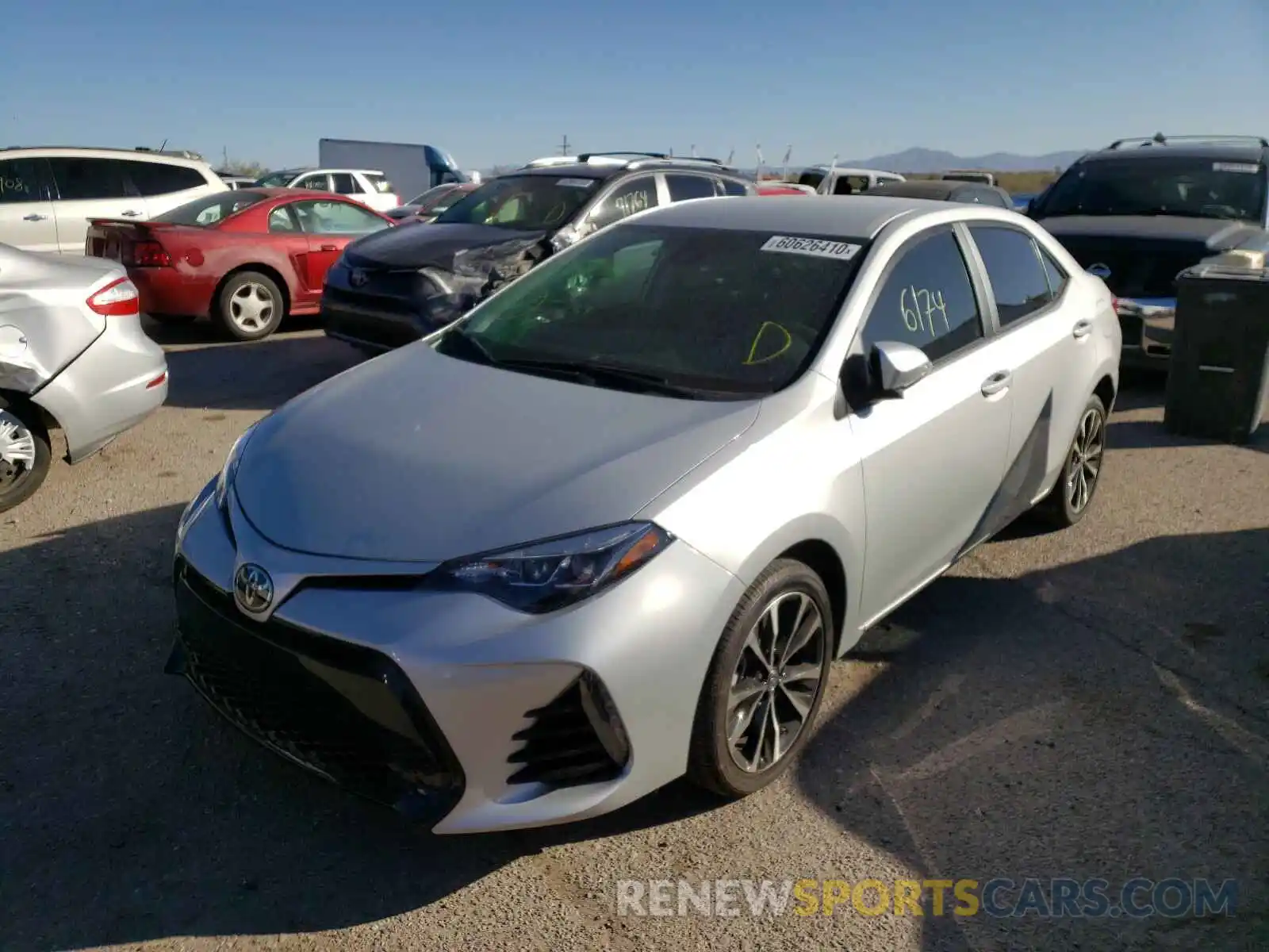 2 Photograph of a damaged car 5YFBURHE9KP869710 TOYOTA COROLLA 2019