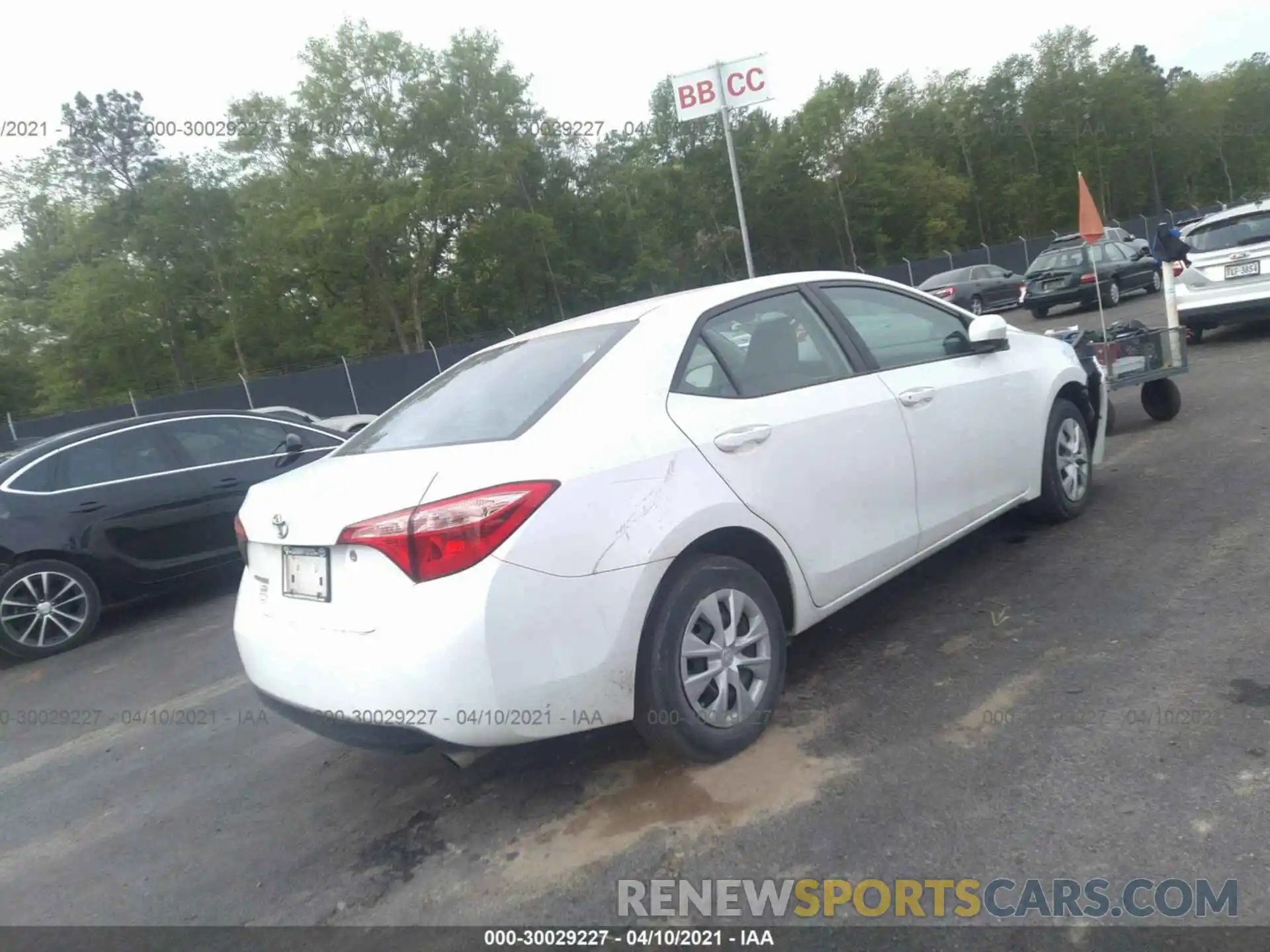 4 Photograph of a damaged car 5YFBURHE9KP871280 TOYOTA COROLLA 2019