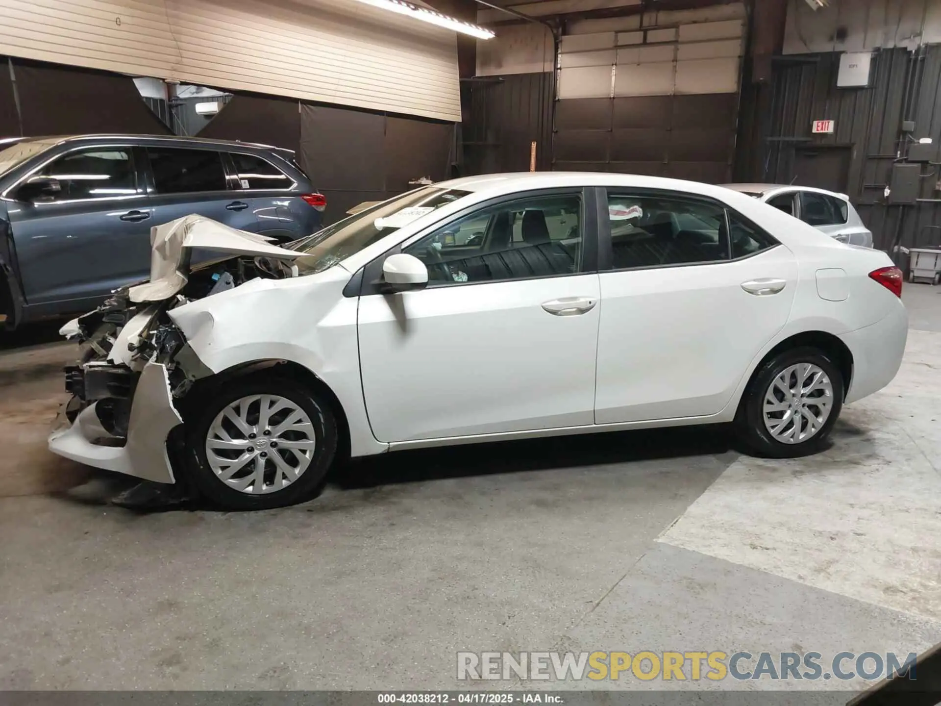 14 Photograph of a damaged car 5YFBURHE9KP871926 TOYOTA COROLLA 2019