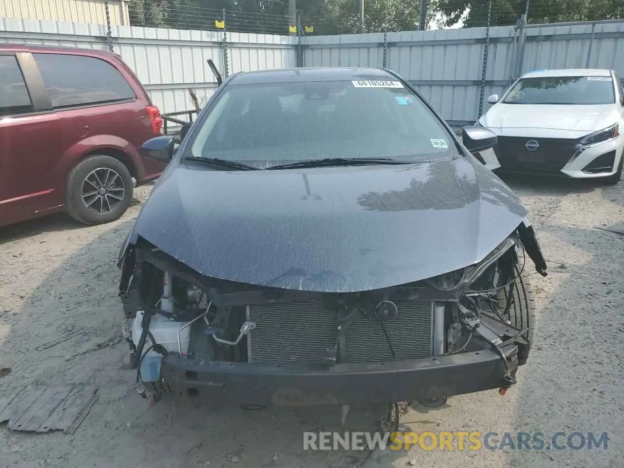 5 Photograph of a damaged car 5YFBURHE9KP877872 TOYOTA COROLLA 2019