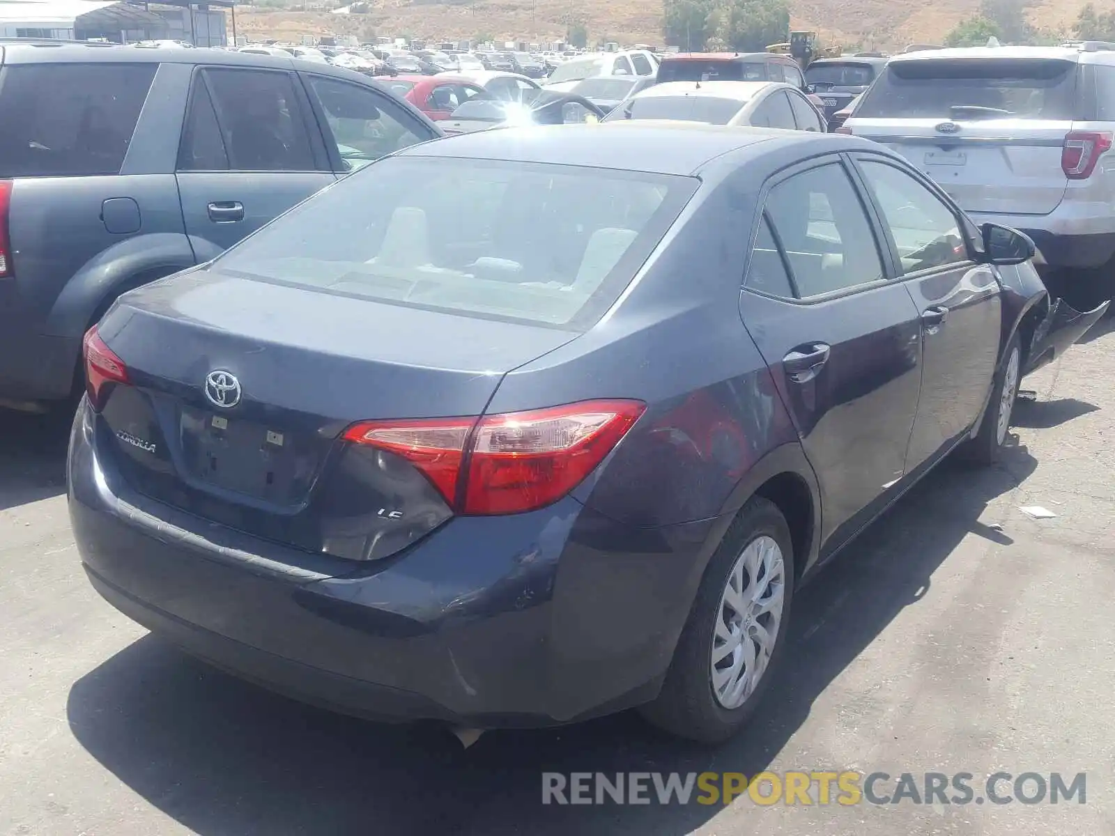 4 Photograph of a damaged car 5YFBURHE9KP897751 TOYOTA COROLLA 2019