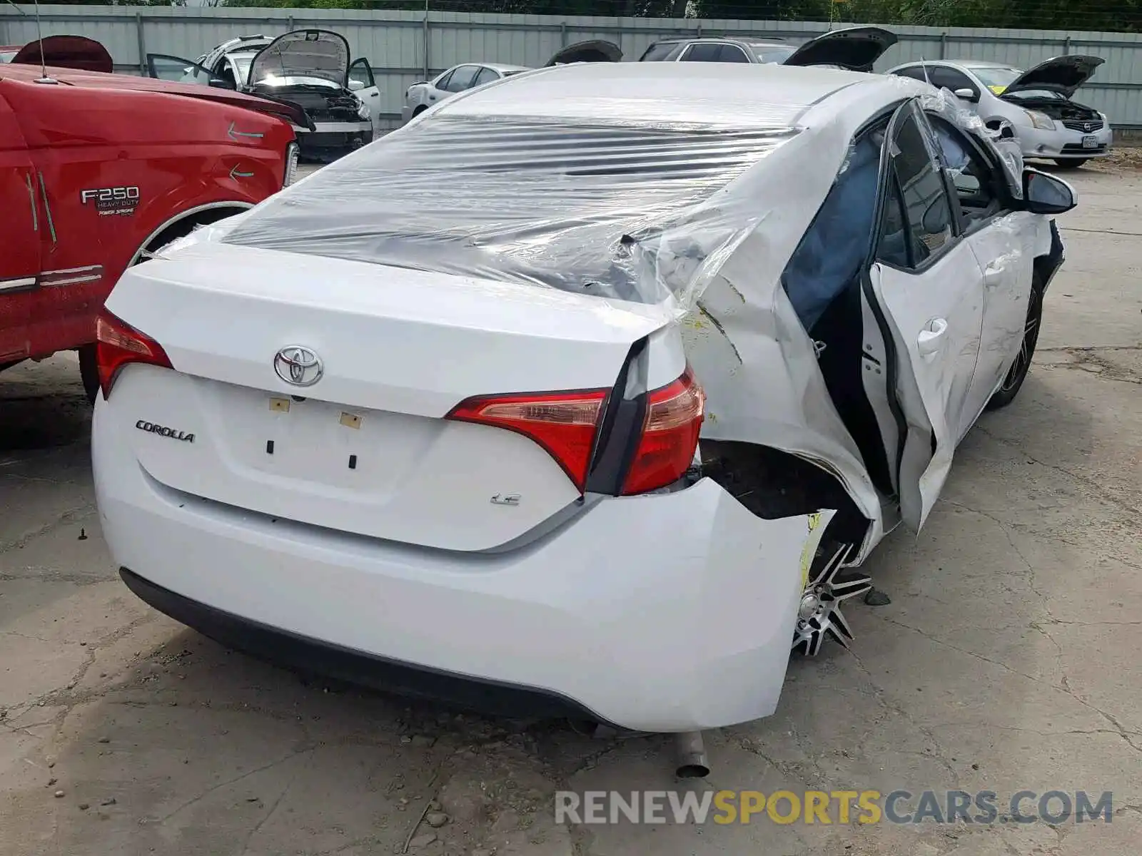 4 Photograph of a damaged car 5YFBURHEXKP865410 TOYOTA COROLLA 2019