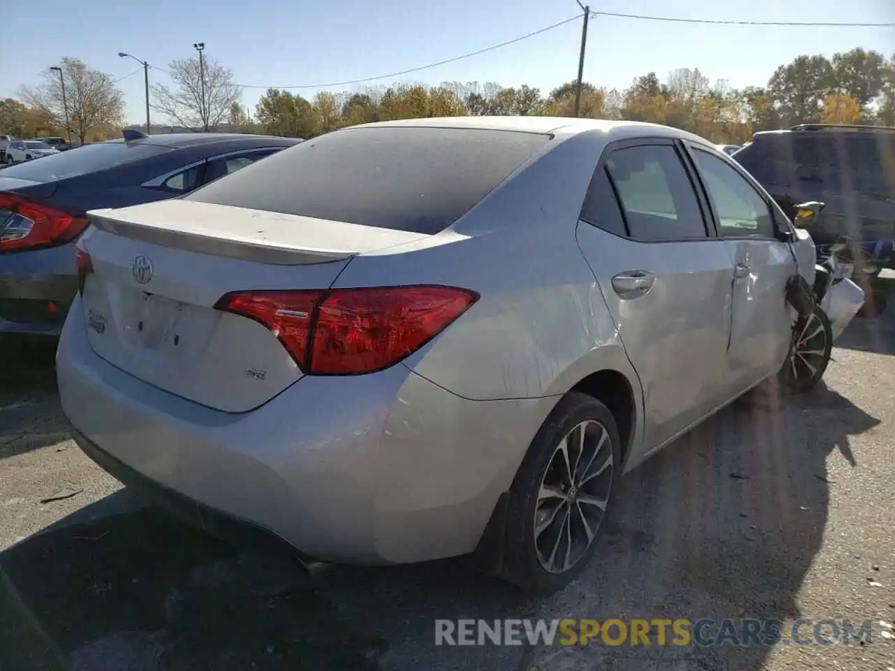 4 Photograph of a damaged car 5YFBURHEXKP939473 TOYOTA COROLLA 2019