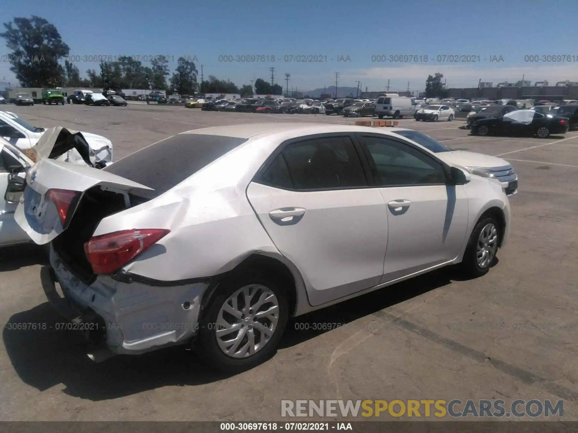 4 Photograph of a damaged car 5YFBURHEXKP940736 TOYOTA COROLLA 2019