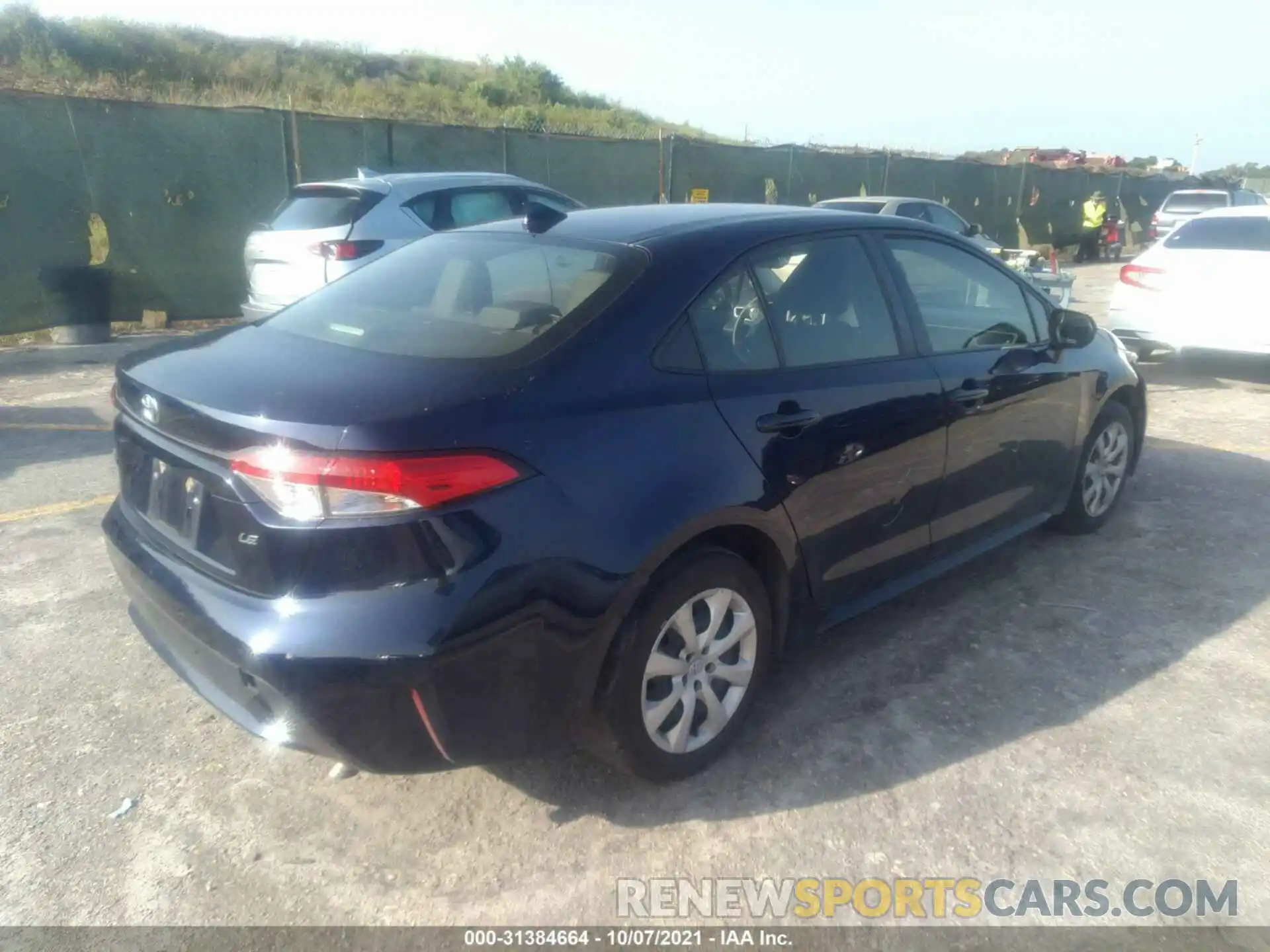 4 Photograph of a damaged car JTDEPRAE1LJ073957 TOYOTA COROLLA 2020