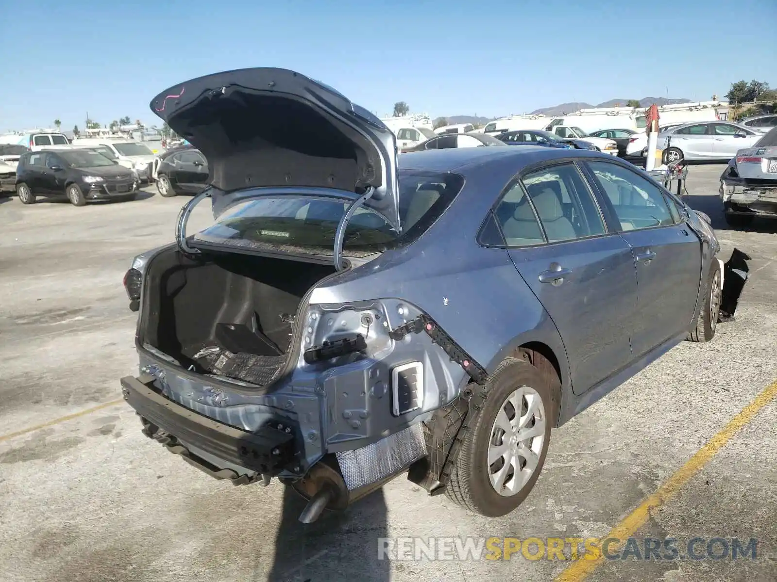 4 Photograph of a damaged car JTDEPRAE8LJ105982 TOYOTA COROLLA 2020