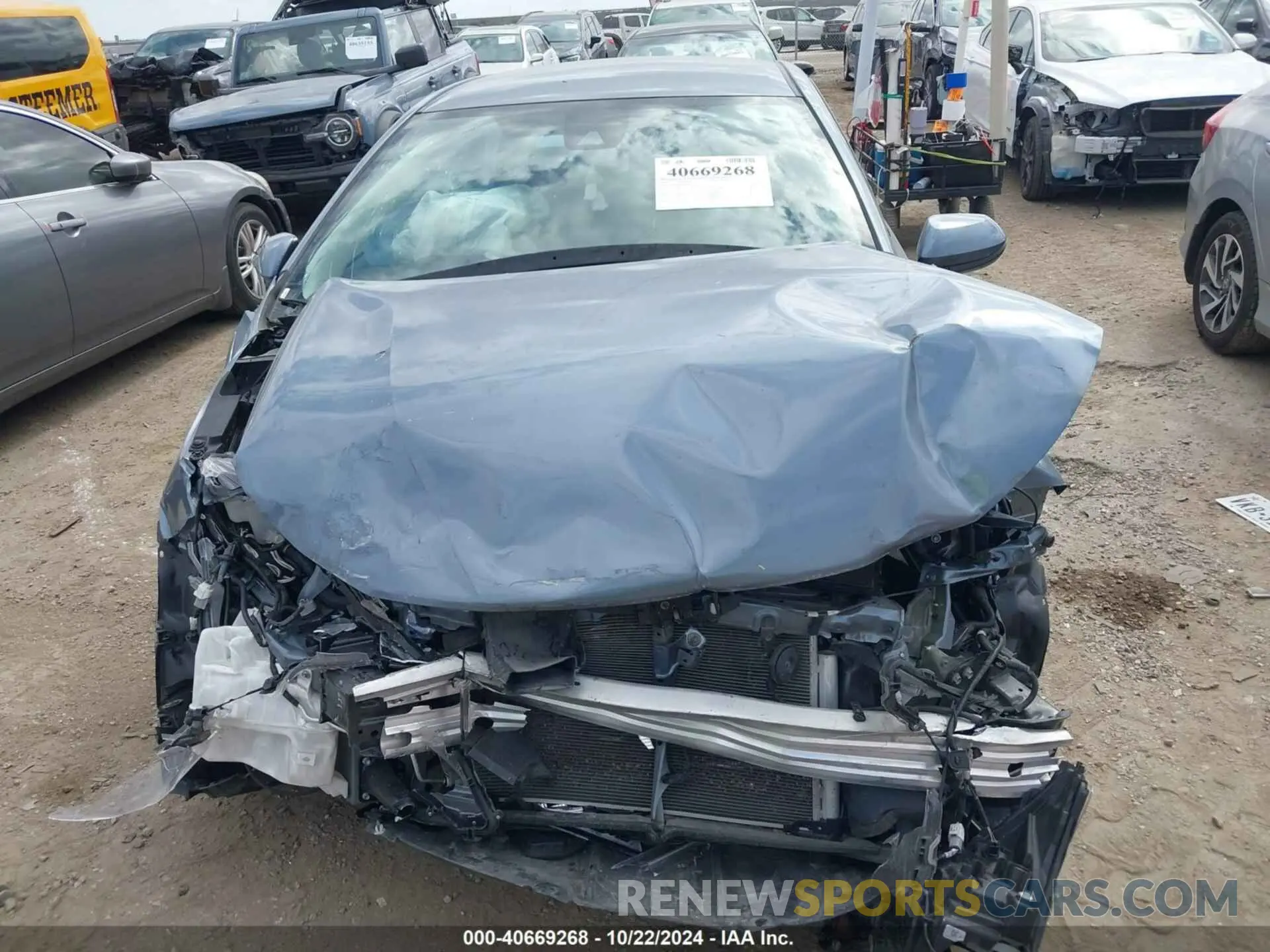 12 Photograph of a damaged car 5YFEPMAE3NP294543 TOYOTA COROLLA 2022