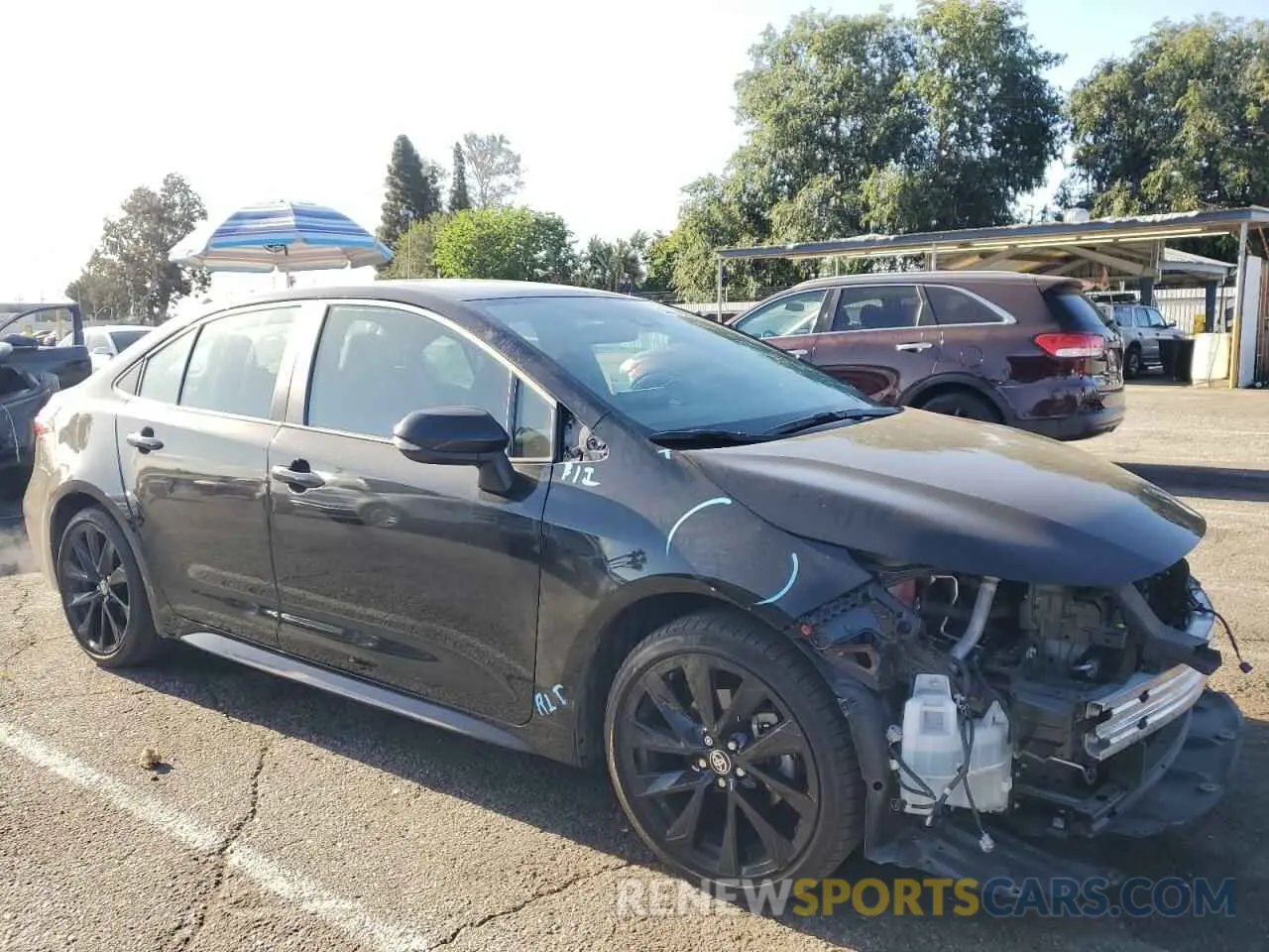4 Photograph of a damaged car 5YFS4MCE9NP133686 TOYOTA COROLLA 2022