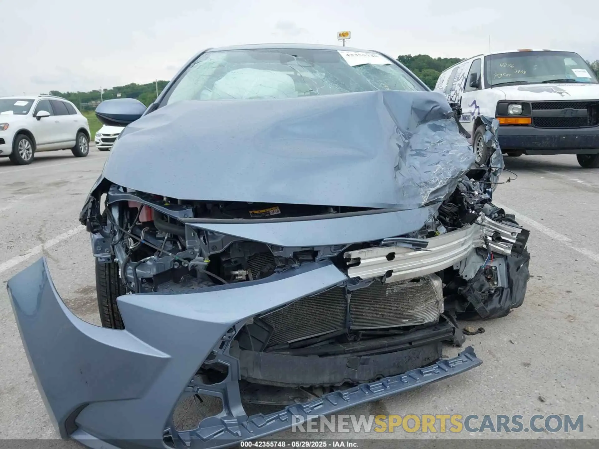 12 Photograph of a damaged car JTDB4MEE8P3004511 TOYOTA COROLLA 2023