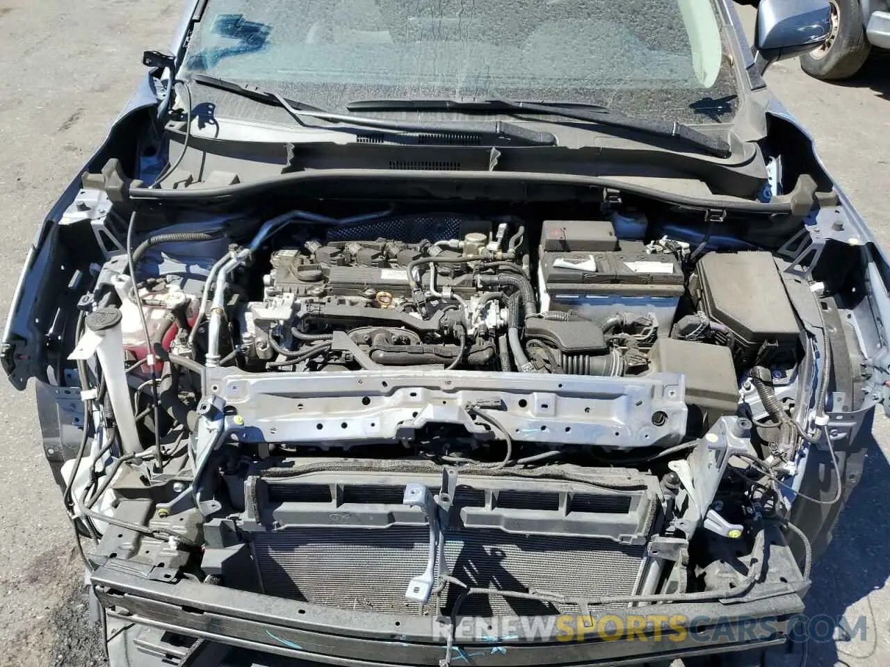 12 Photograph of a damaged car 7MUDAAAG1NV011390 TOYOTA COROLLA CR 2022