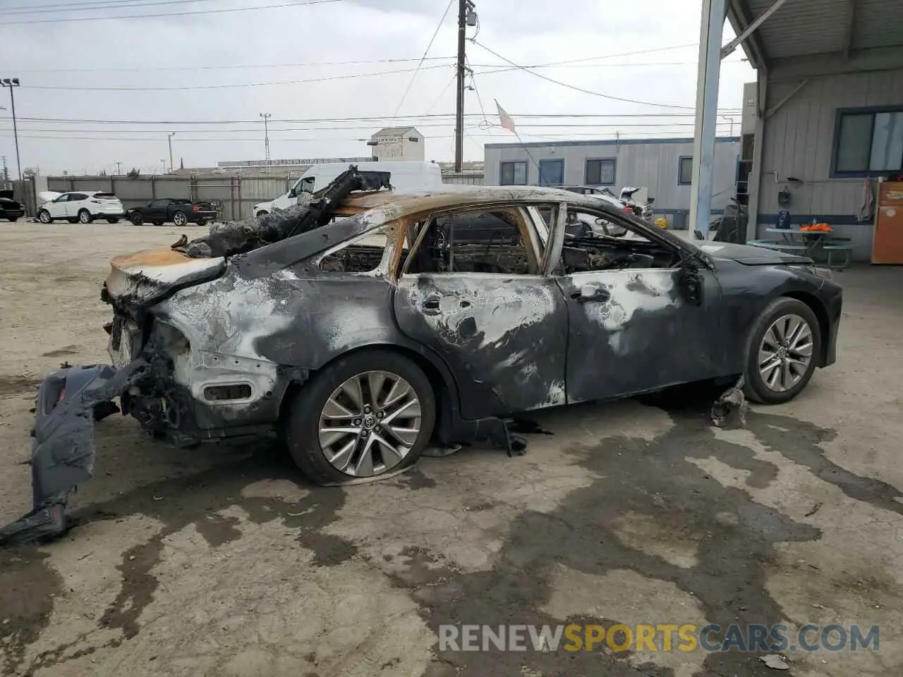 3 Photograph of a damaged car JTDAAAAA9NA007450 TOYOTA MIRAI LE 2022