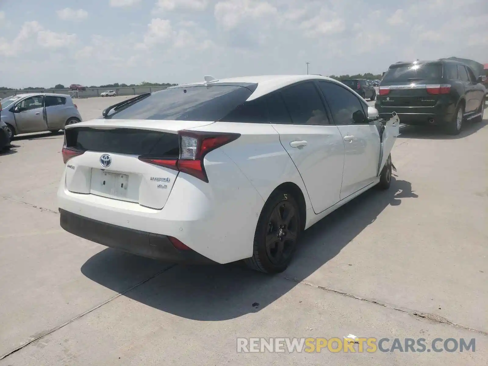 4 Photograph of a damaged car JTDKARFU2K3076695 TOYOTA PRIUS 2019