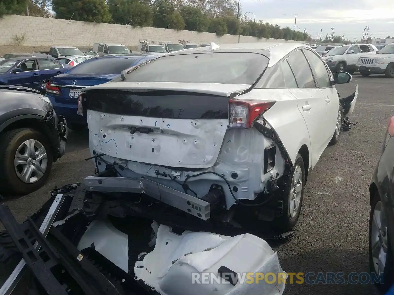 4 Photograph of a damaged car JTDKARFU2K3092623 TOYOTA PRIUS 2019