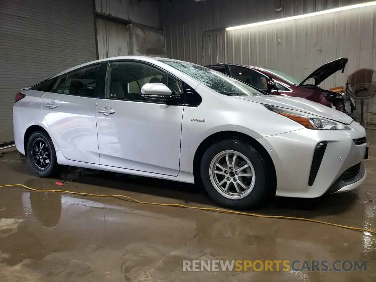 4 Photograph of a damaged car JTDKARFU3K3085289 TOYOTA PRIUS 2019