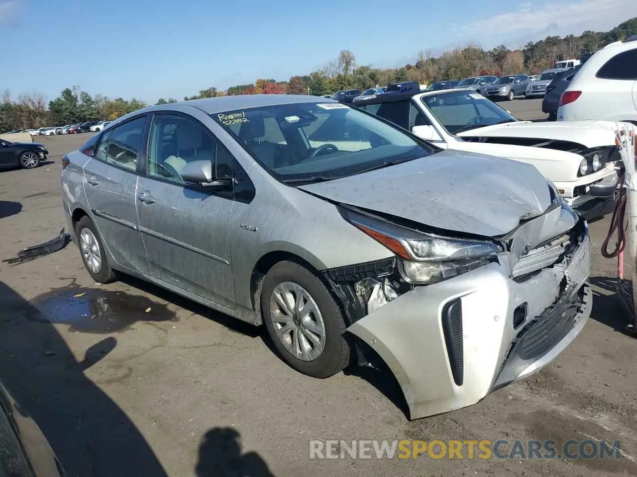 4 Photograph of a damaged car JTDKARFU4K3099735 TOYOTA PRIUS 2019