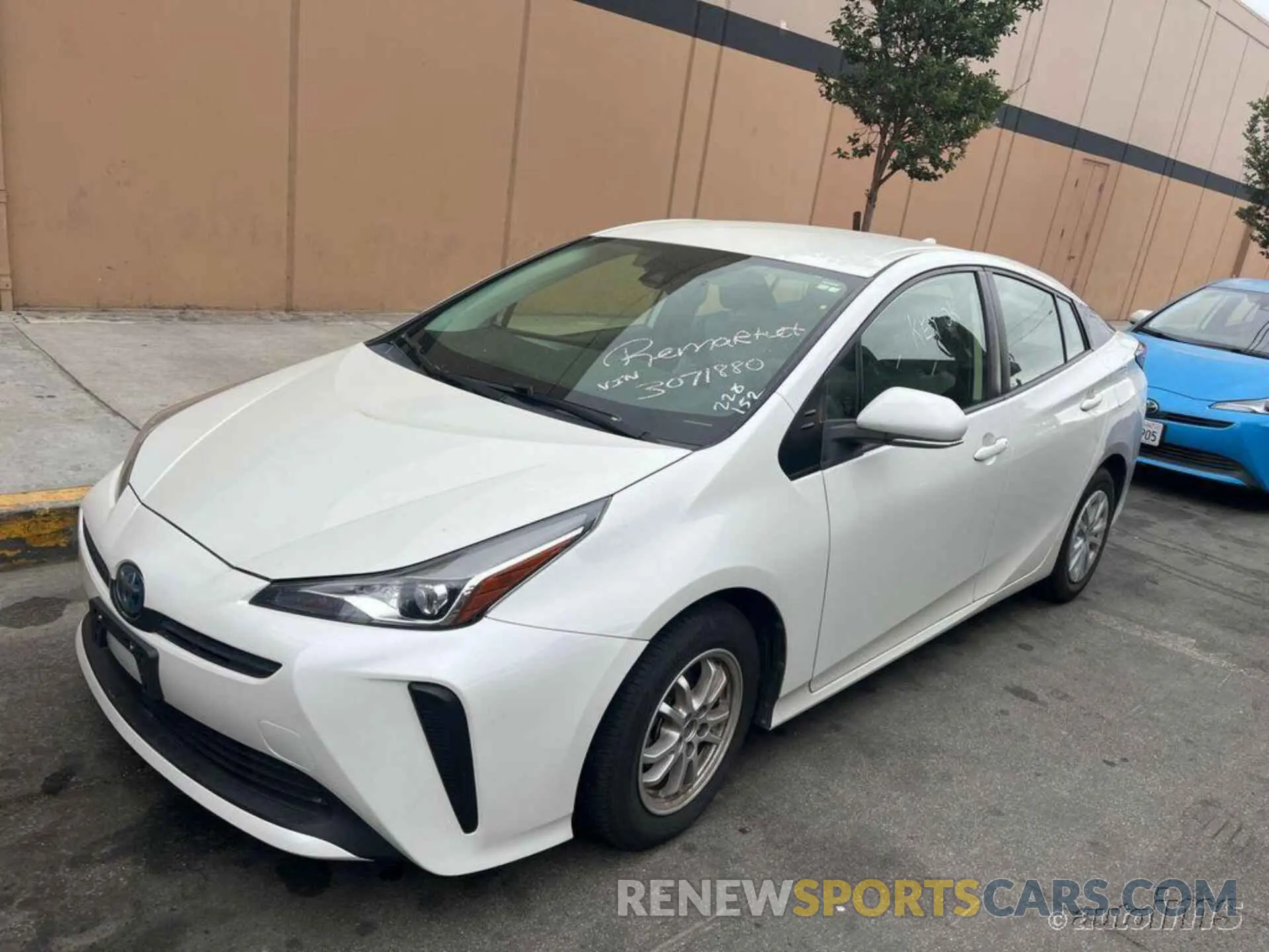 2 Photograph of a damaged car JTDKARFU5K3071880 TOYOTA PRIUS 2019