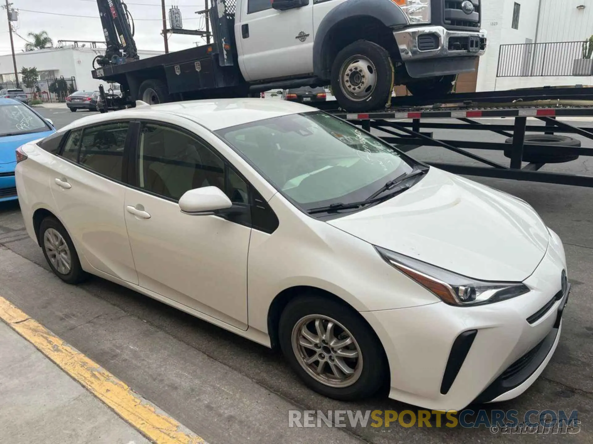 5 Photograph of a damaged car JTDKARFU5K3071880 TOYOTA PRIUS 2019