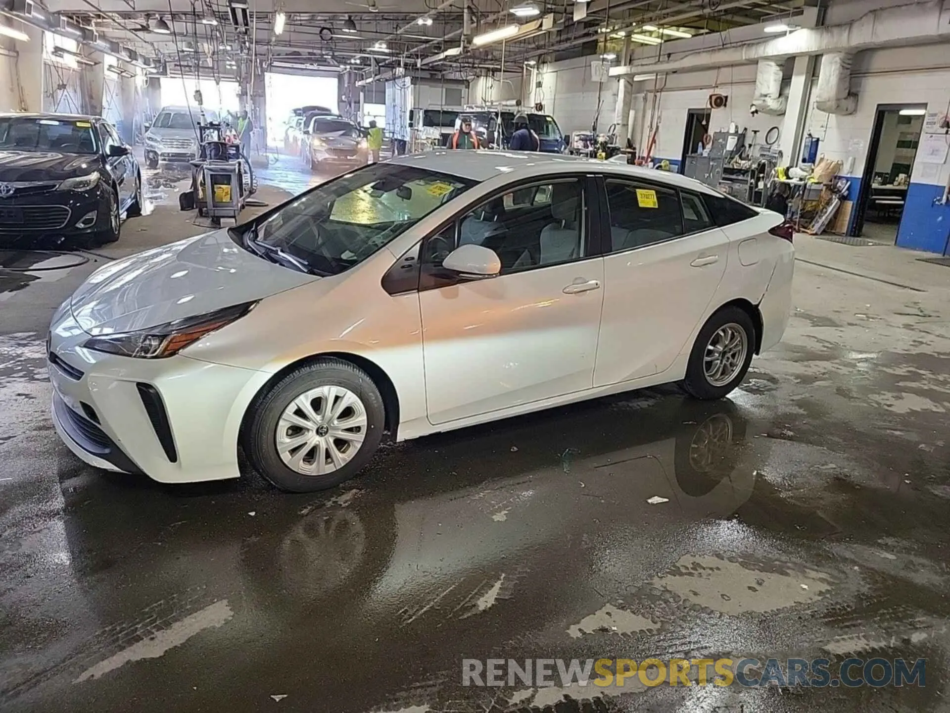11 Photograph of a damaged car JTDKARFU6K3069667 TOYOTA PRIUS 2019