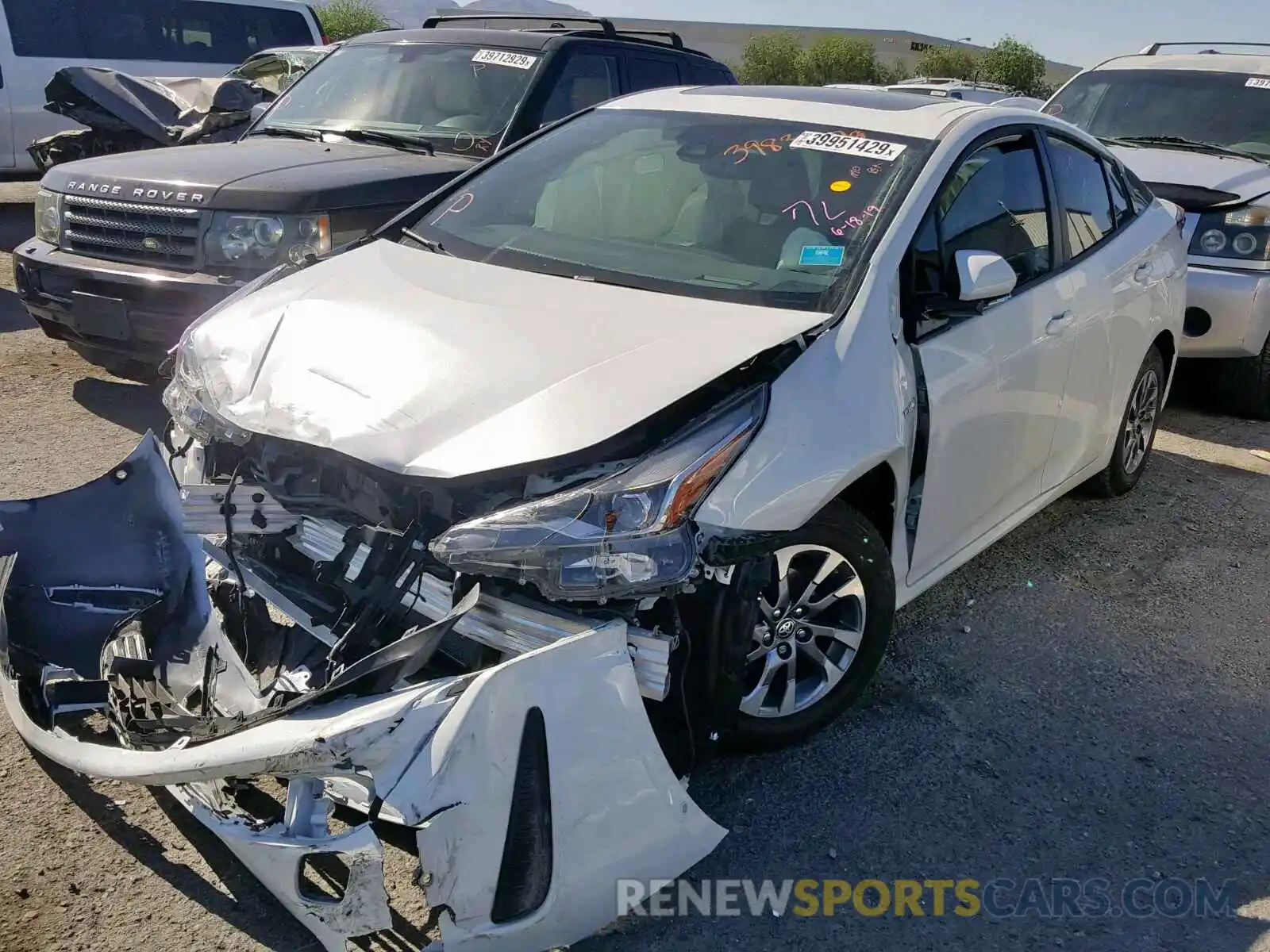 2 Photograph of a damaged car JTDKARFU6K3070849 TOYOTA PRIUS 2019