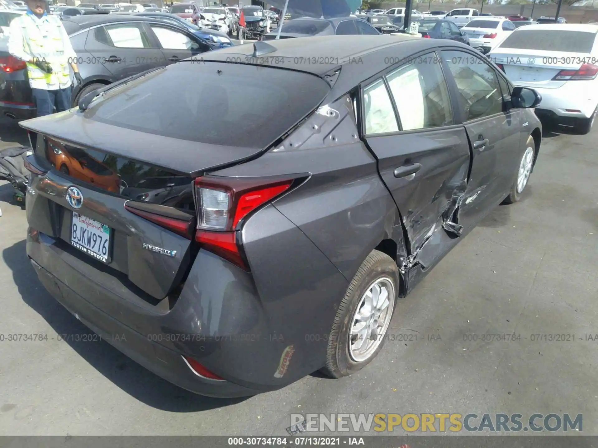 4 Photograph of a damaged car JTDKARFU7K3069242 TOYOTA PRIUS 2019