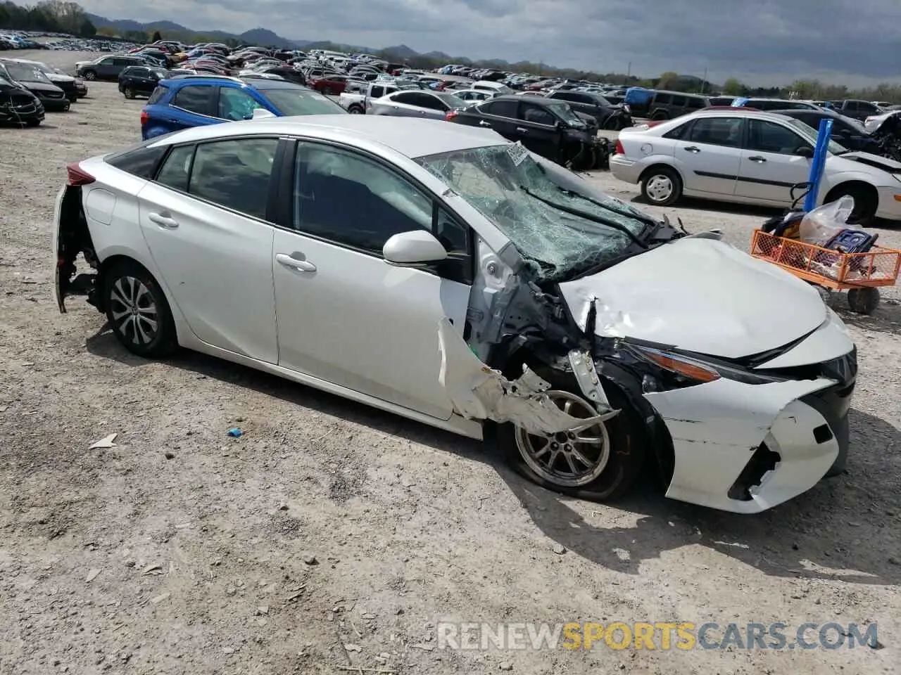 4 Photograph of a damaged car JTDKAMFP1M3165285 TOYOTA PRIUS 2021
