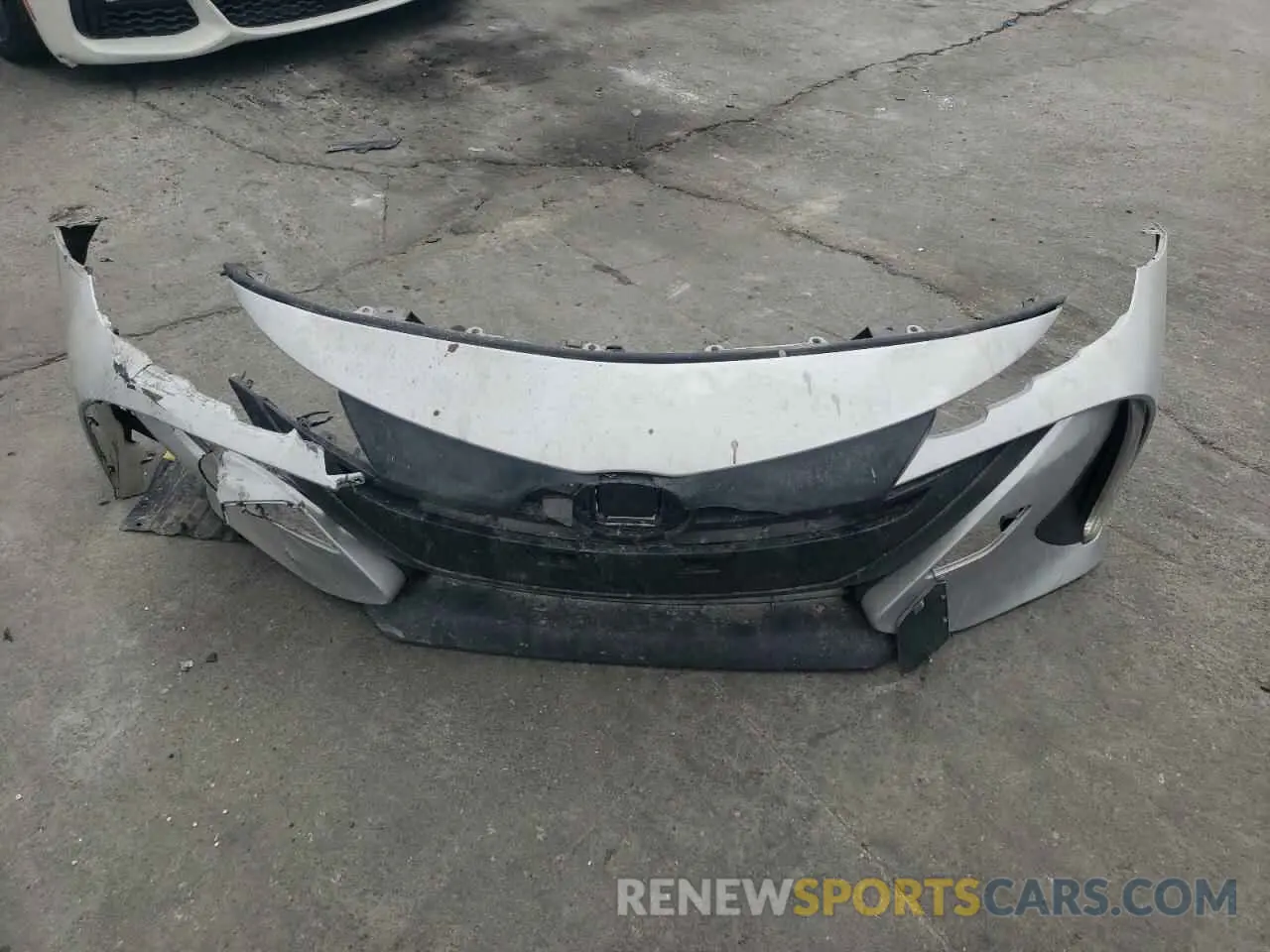 12 Photograph of a damaged car JTDKAMFP4M3184154 TOYOTA PRIUS 2021