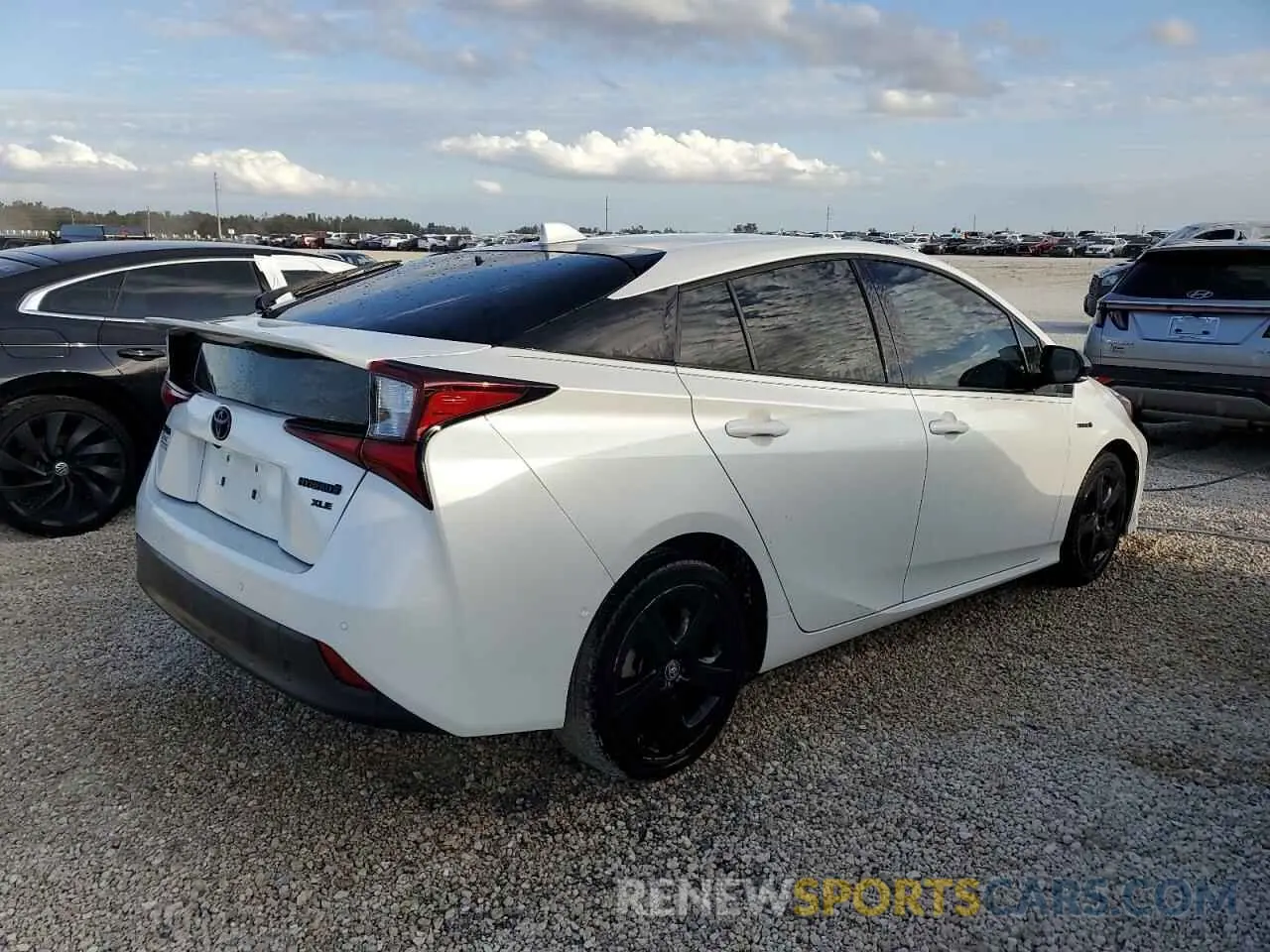 3 Photograph of a damaged car JTDKAMFU2M3127893 TOYOTA PRIUS 2021