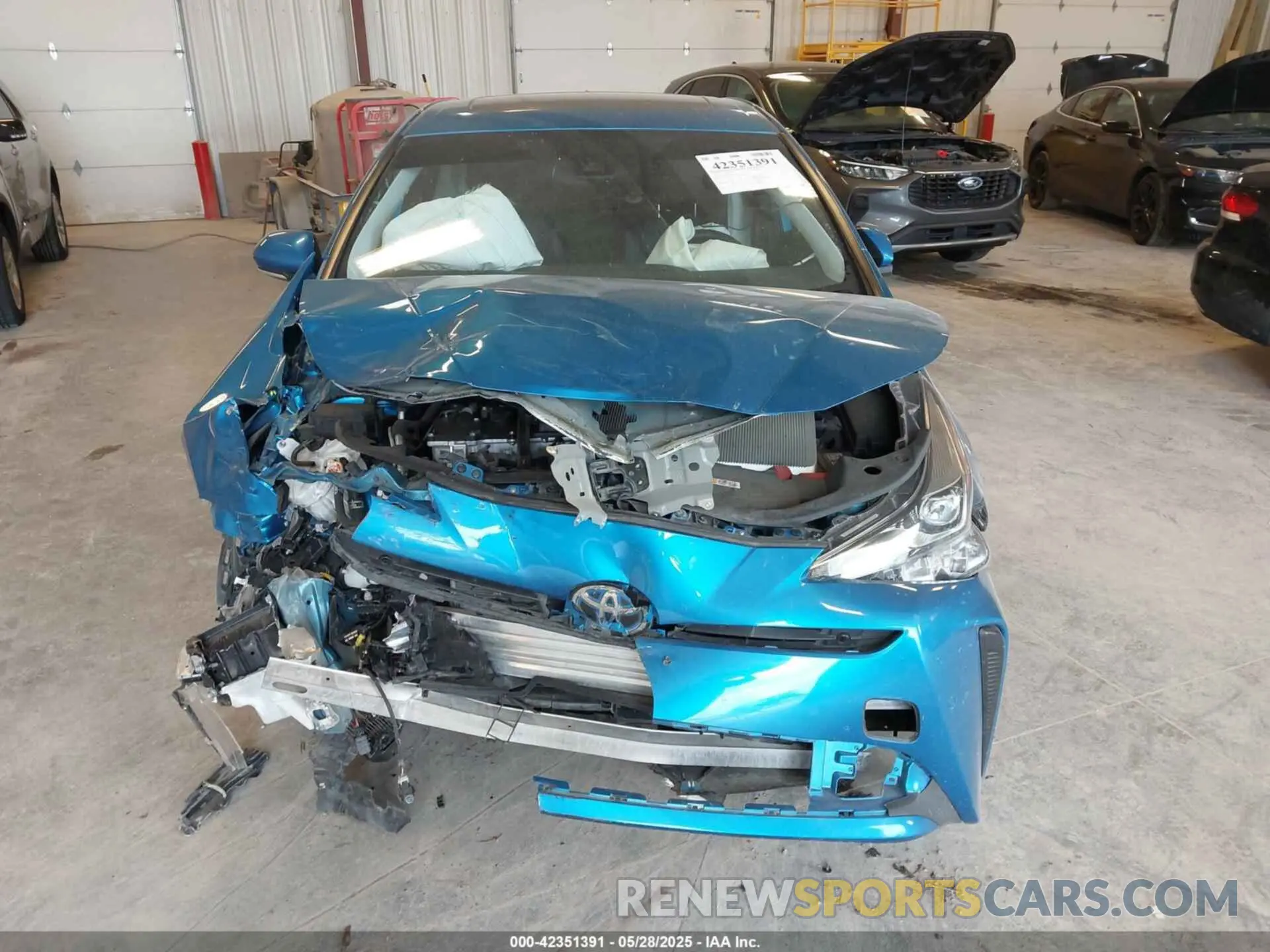 12 Photograph of a damaged car JTDKAMFU9M3133206 TOYOTA PRIUS 2021