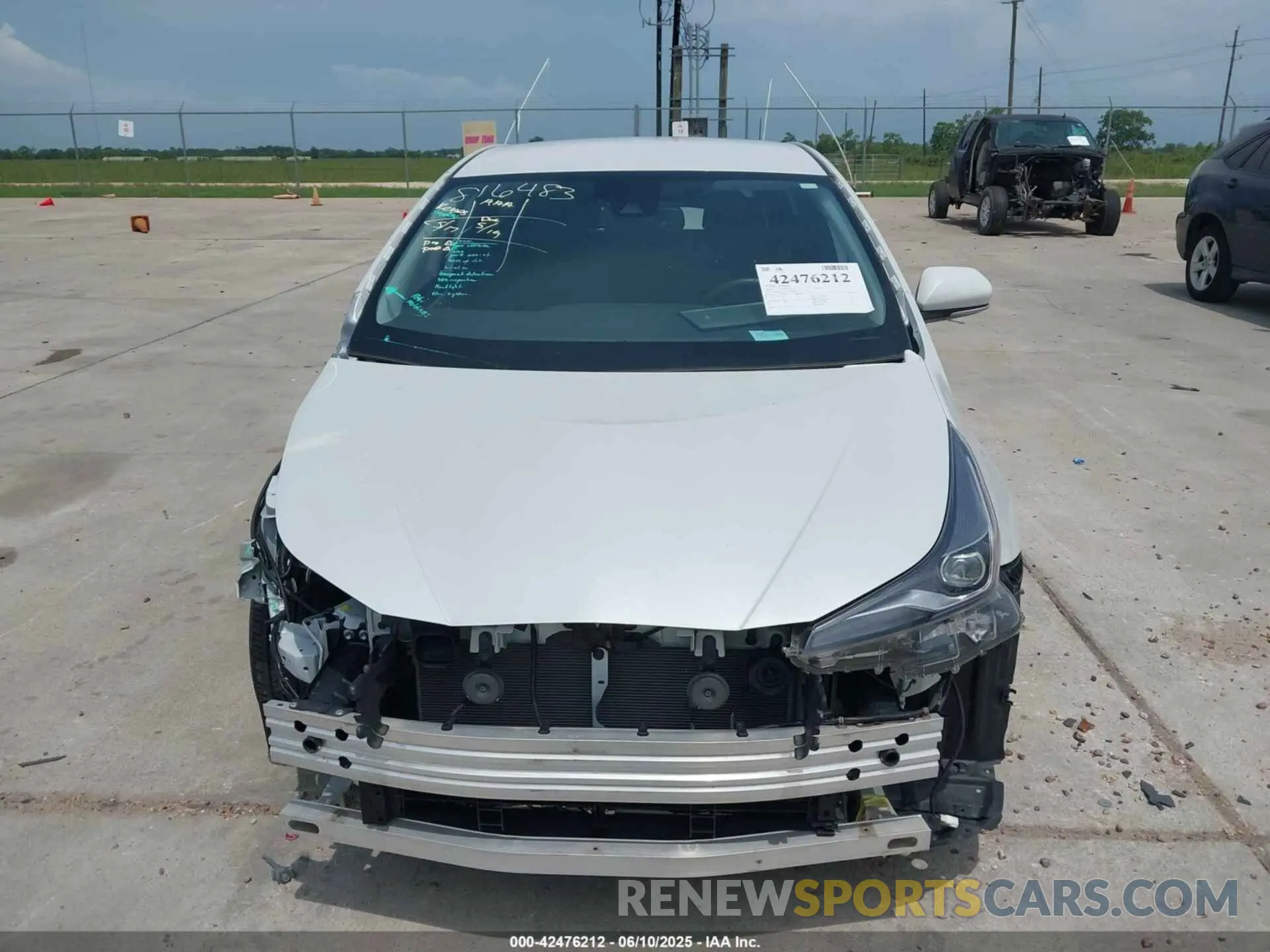12 Photograph of a damaged car JTDKAMFU9M3136865 TOYOTA PRIUS 2021