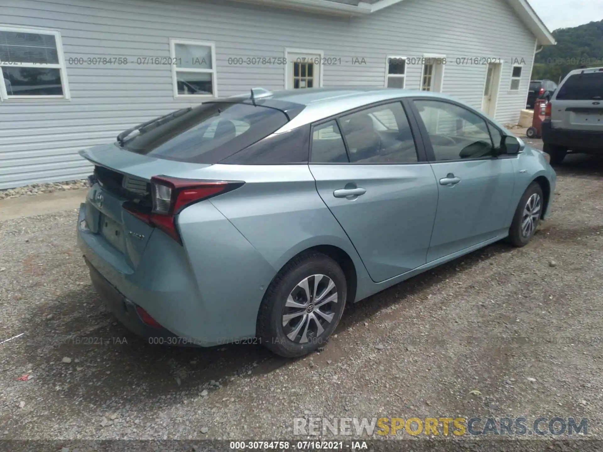 4 Photograph of a damaged car JTDL9MFU5M3025260 TOYOTA PRIUS 2021