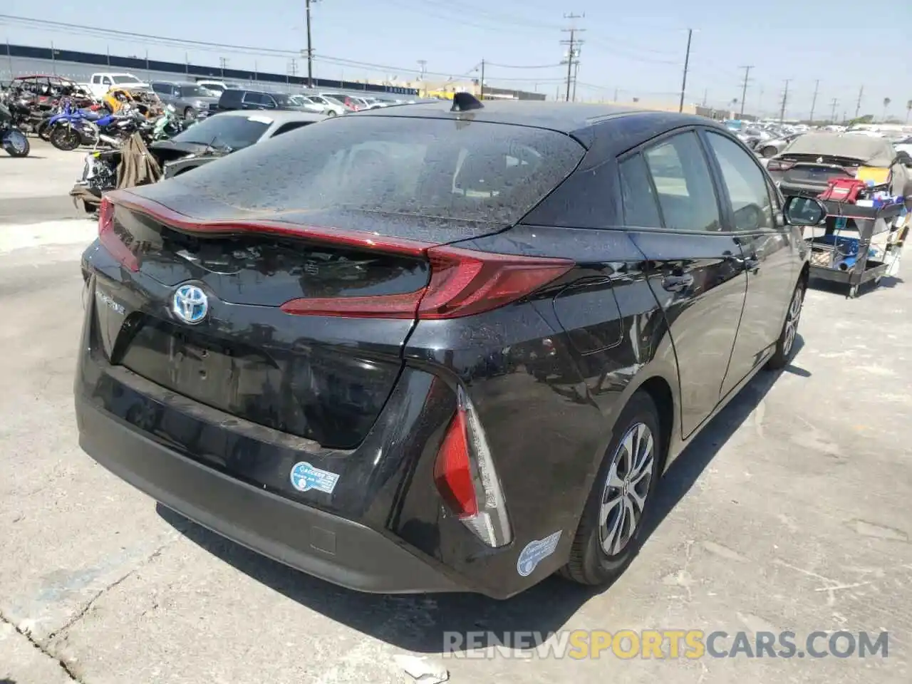 4 Photograph of a damaged car JTDKAMFP0N3201324 TOYOTA PRIUS 2022