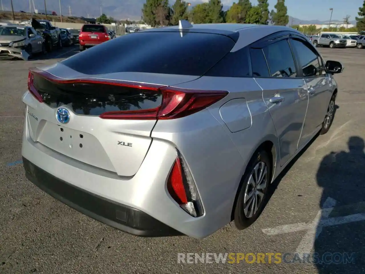 4 Photograph of a damaged car JTDKAMFP1N3199146 TOYOTA PRIUS 2022