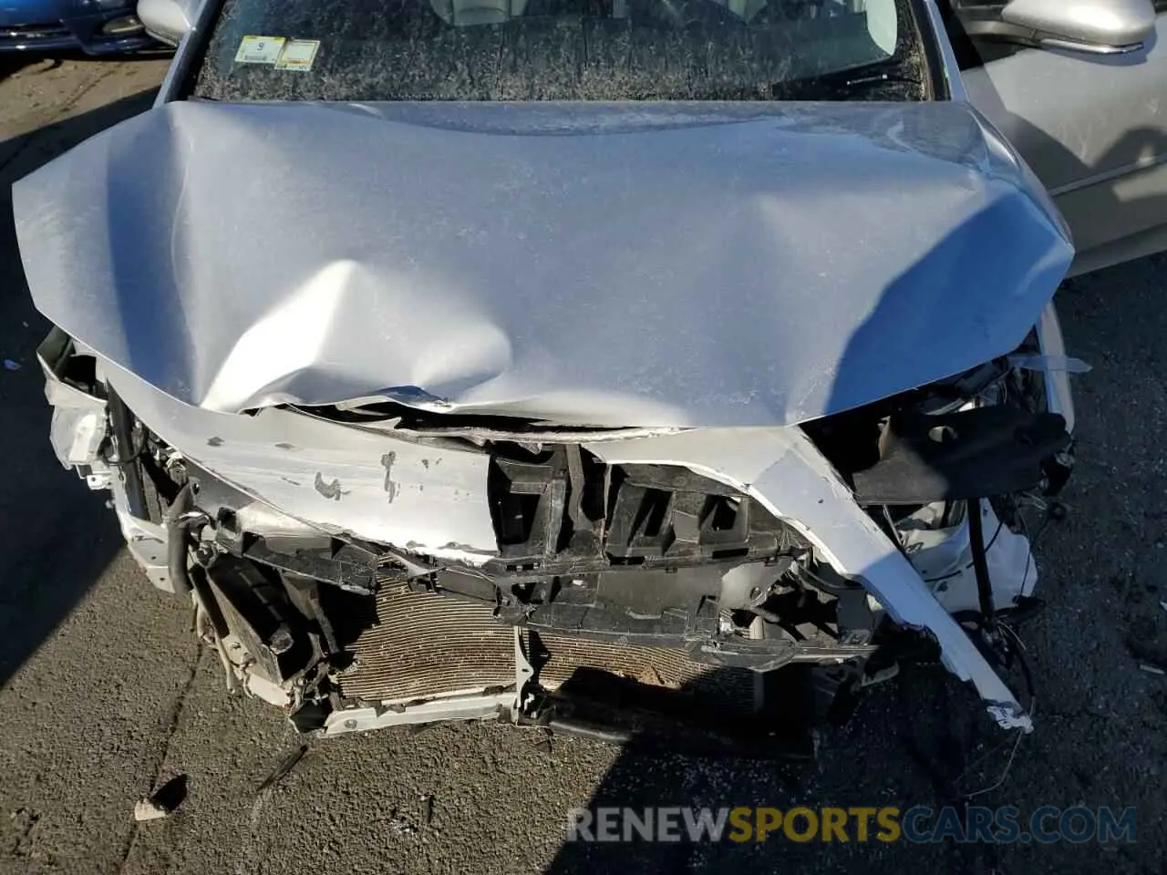 11 Photograph of a damaged car JTDKAMFP3N3204119 TOYOTA PRIUS 2022