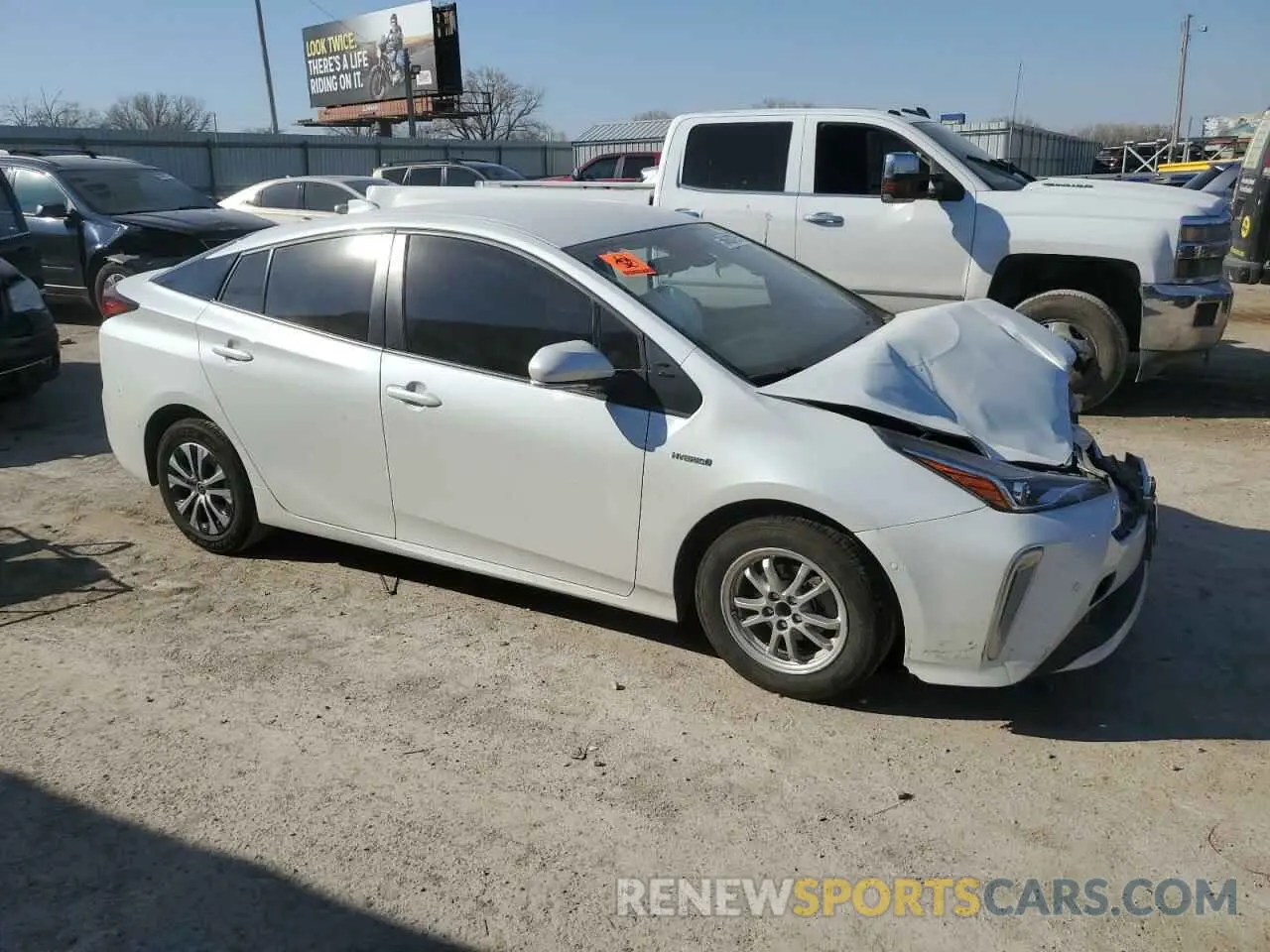 4 Photograph of a damaged car JTDL9MFU9N3034254 TOYOTA PRIUS 2022