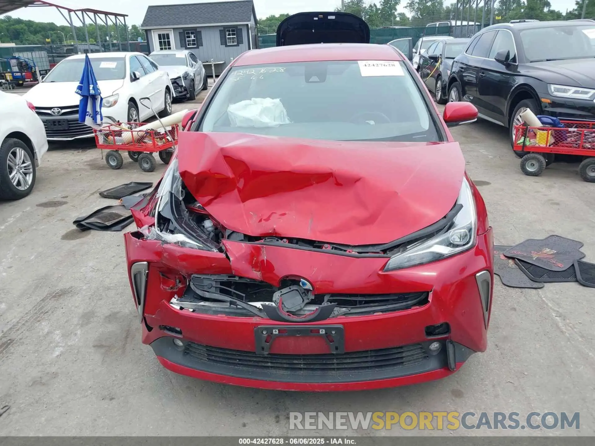 12 Photograph of a damaged car JTDL9MFU9N3034304 TOYOTA PRIUS 2022