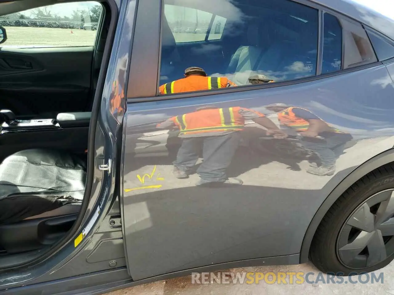 12 Photograph of a damaged car JTDACAAU1P3002299 TOYOTA PRIUS 2023
