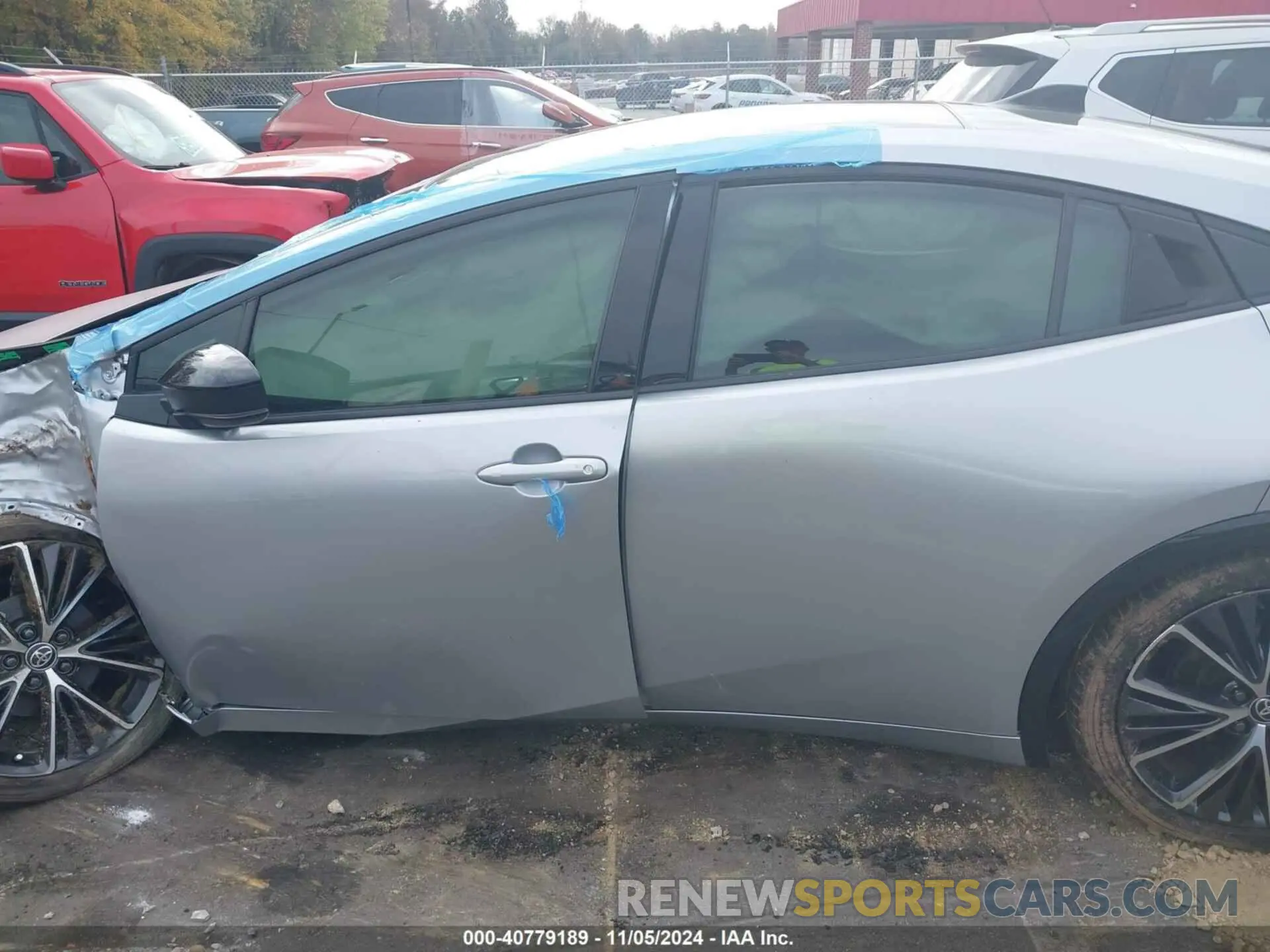 14 Photograph of a damaged car JTDACAAU6P3011449 TOYOTA PRIUS 2023