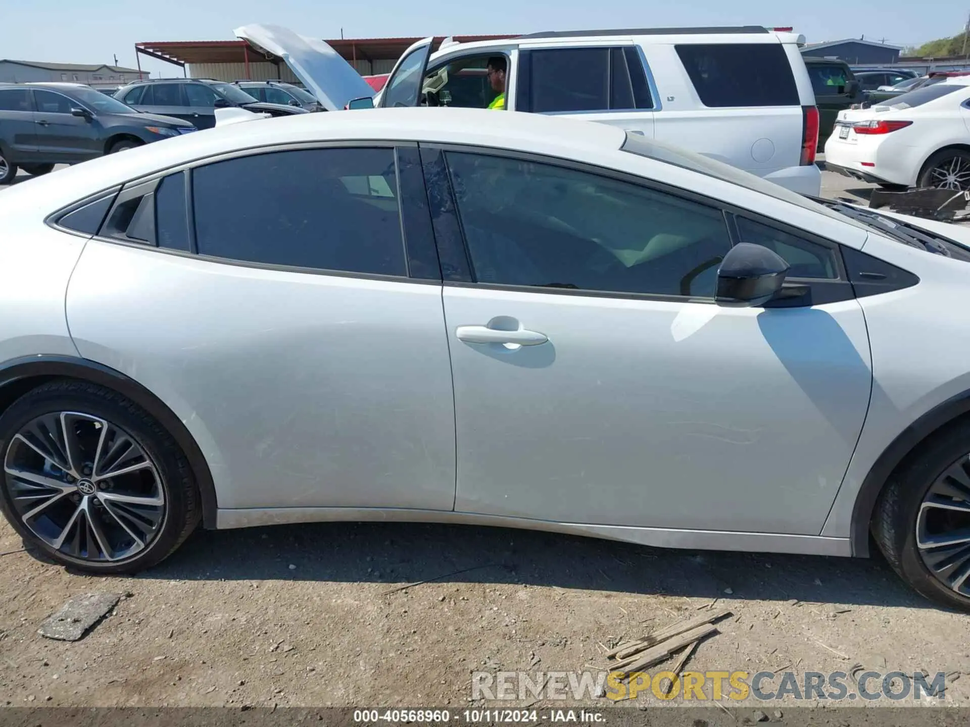 13 Photograph of a damaged car JTDACAAU6P3011869 TOYOTA PRIUS 2023